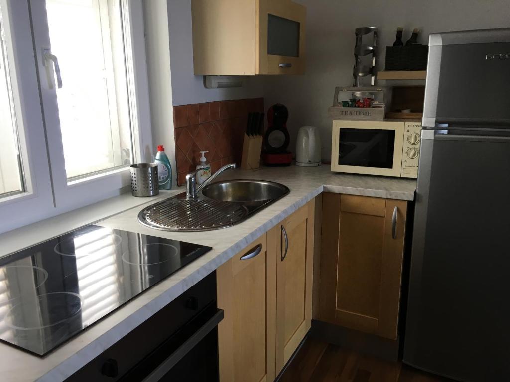 Kuchyň nebo kuchyňský kout v ubytování Apartment Selce Kala