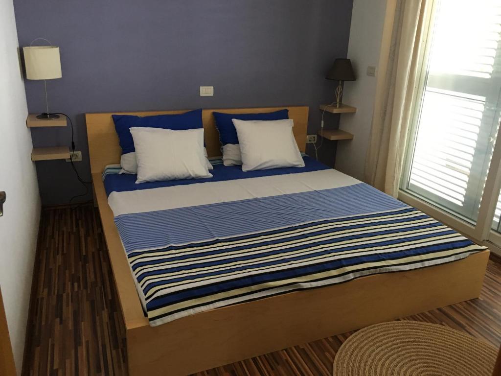 Postel nebo postele na pokoji v ubytování Apartment Selce Kala