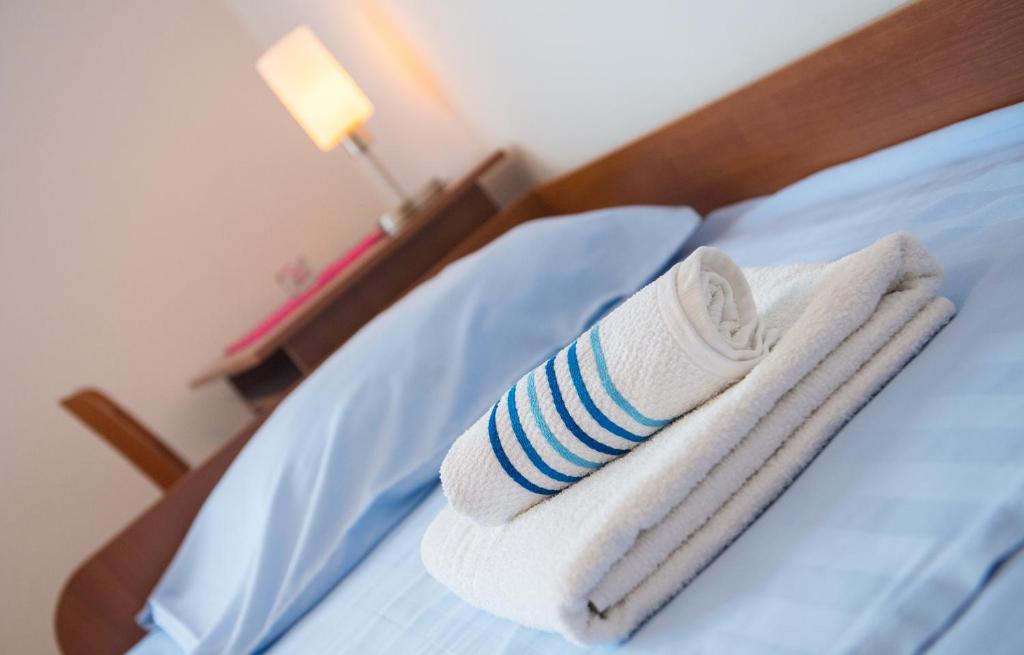 Postel nebo postele na pokoji v ubytování Guest House Agava