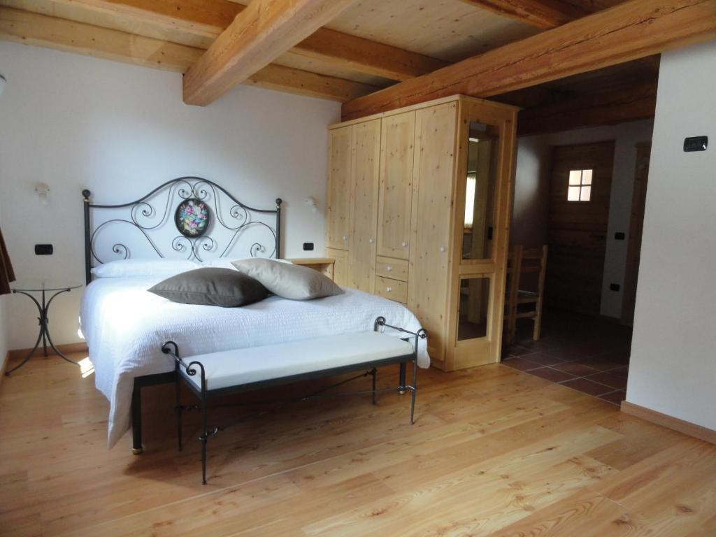 Posteľ alebo postele v izbe v ubytovaní B&B Mas di Zonadi