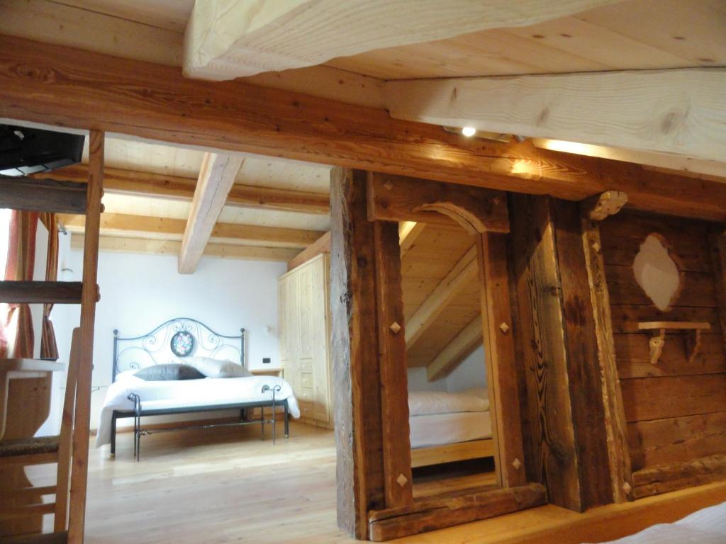 Posteľ alebo postele v izbe v ubytovaní B&B Mas di Zonadi