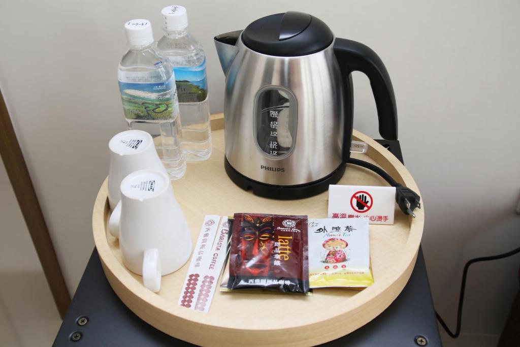 Příslušenství pro přípravu čaje a kávy v ubytování 野居海景渡假民宿Simple Life Home Stay
