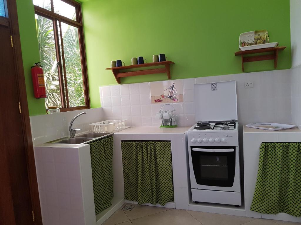 Kuchyň nebo kuchyňský kout v ubytování Daeli Apartment
