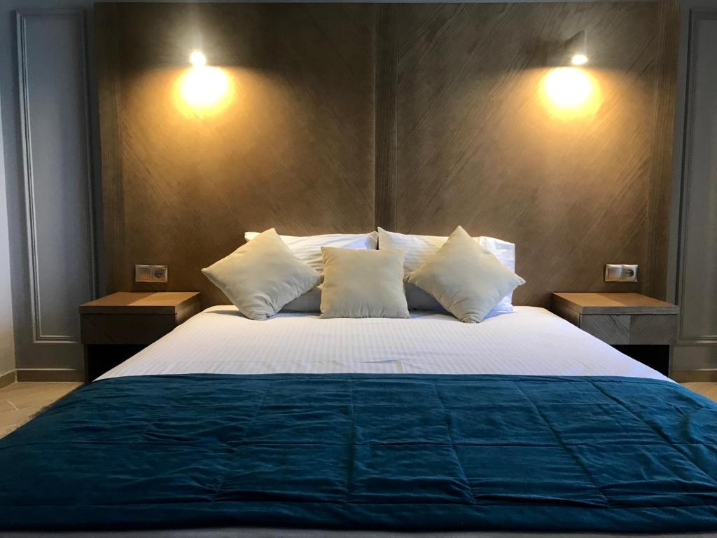 Postel nebo postele na pokoji v ubytování Boomerang Boutique Hotel