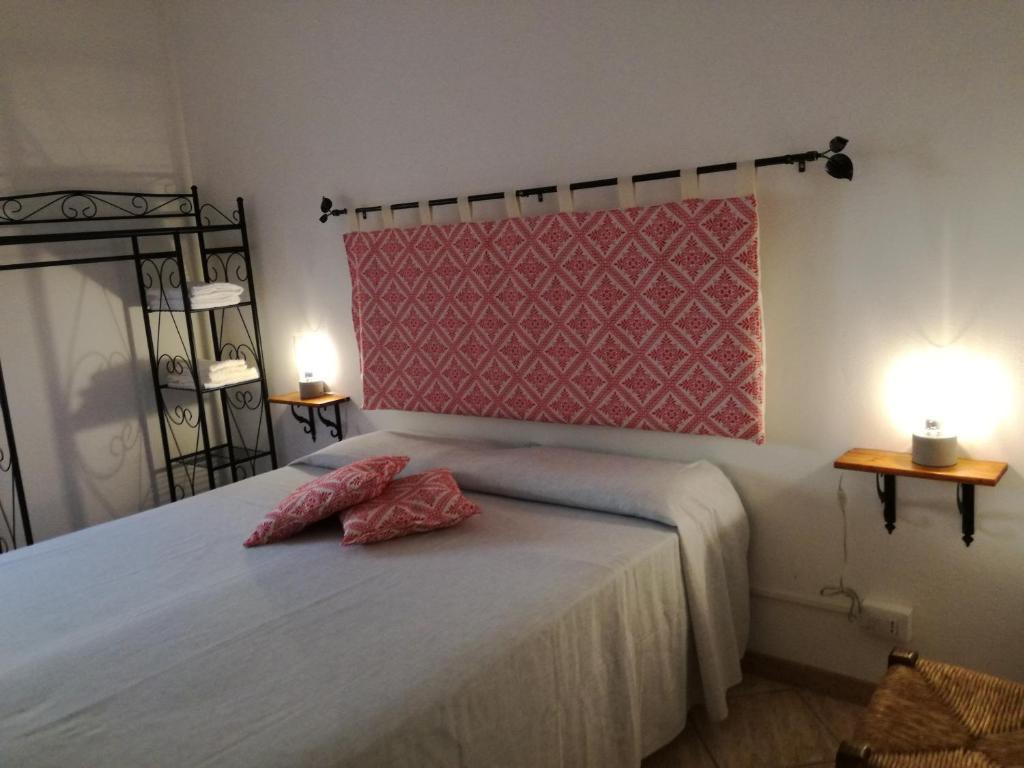 Postel nebo postele na pokoji v ubytování Zia Amalia Villa Asfodelo
