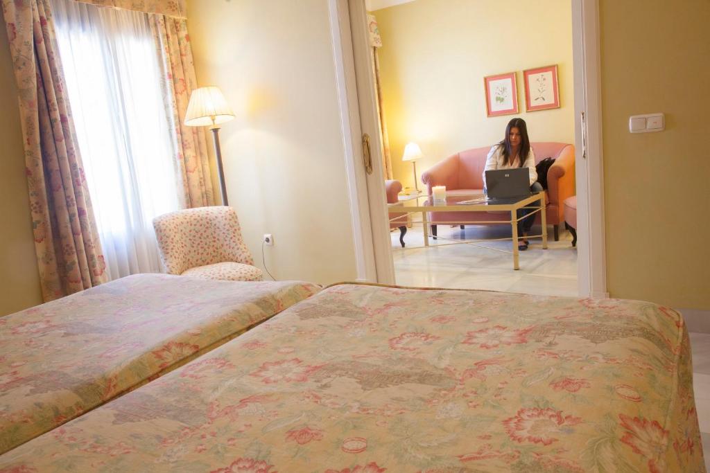 Postel nebo postele na pokoji v ubytování Villa Jerez