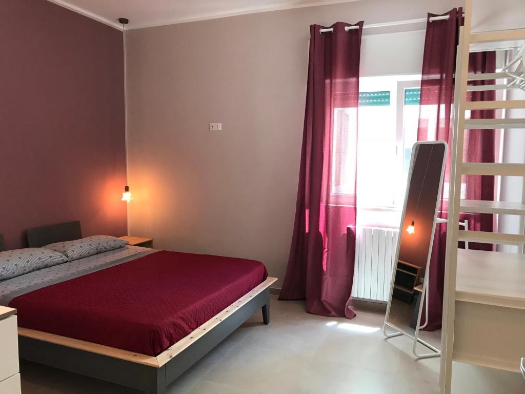 Łóżko lub łóżka w pokoju w obiekcie Apartment Antonella