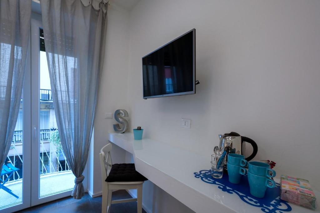 Telewizja i/lub zestaw kina domowego w obiekcie Galleria 38