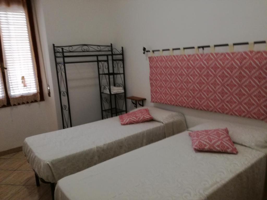 Postel nebo postele na pokoji v ubytování Zia Amalia Villa Asfodelo