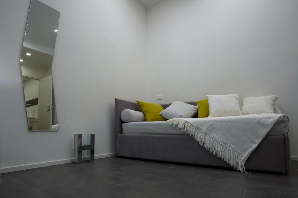 Łóżko lub łóżka w pokoju w obiekcie Galleria 38