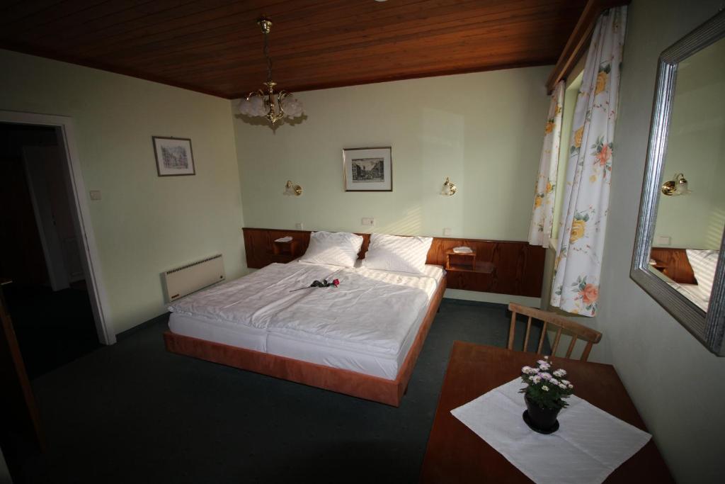 Postel nebo postele na pokoji v ubytování Haus Wolfgang