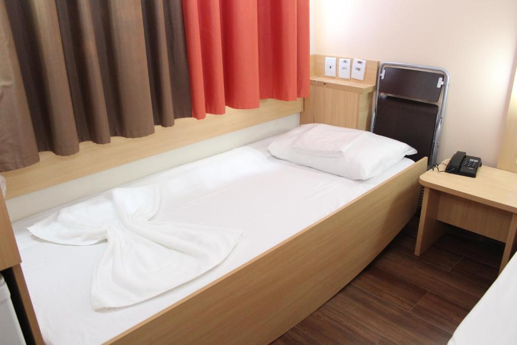 Postel nebo postele na pokoji v ubytování ibis Feira de Santana