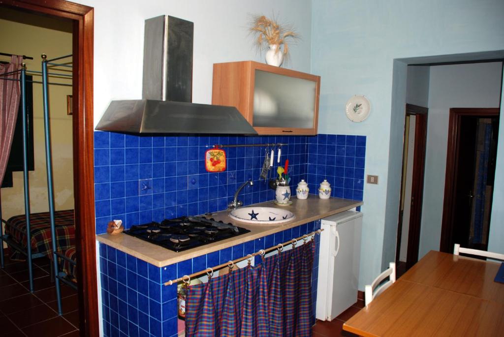 Kuchyň nebo kuchyňský kout v ubytování Terrauzza Sul Mare di Renata Emmolo
