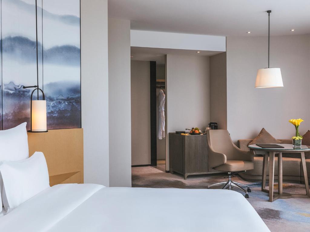 Postel nebo postele na pokoji v ubytování Pullman Fuzhou Tahoe