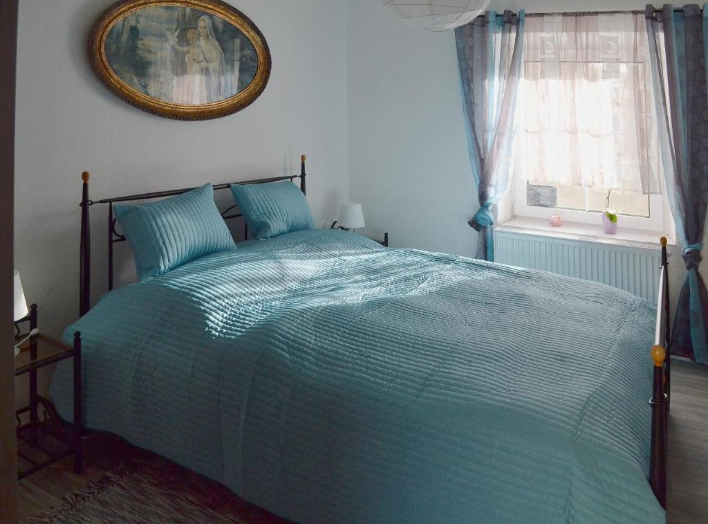 Postel nebo postele na pokoji v ubytování Apartman75