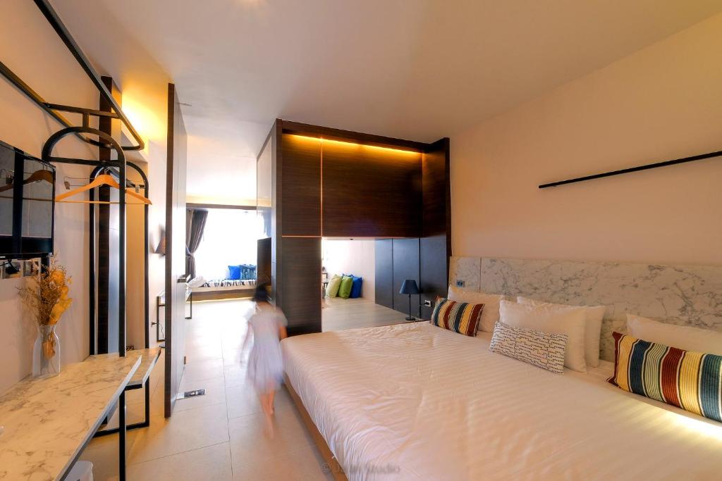 Postel nebo postele na pokoji v ubytování NornDee Hotel