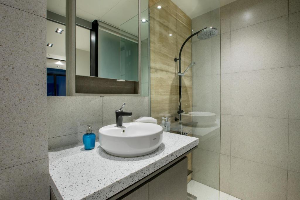 Koupelna v ubytování Expressionz Suites By iHost Global