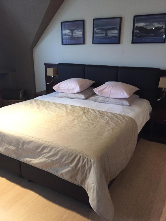 Postel nebo postele na pokoji v ubytování Hotel Prélude