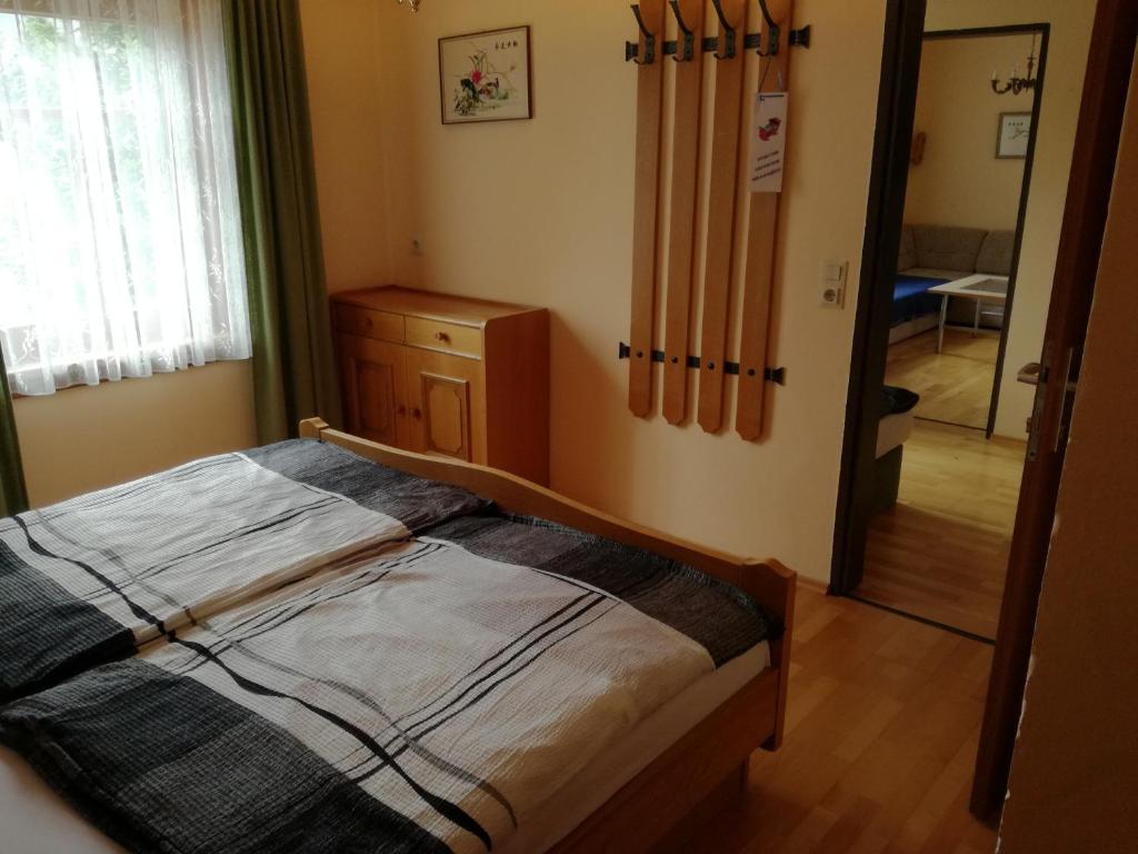 Postel nebo postele na pokoji v ubytování Gasthof Kirchenwirt