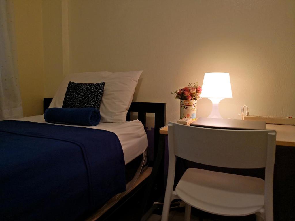 Postel nebo postele na pokoji v ubytování Chan Cha La 99 Hostel