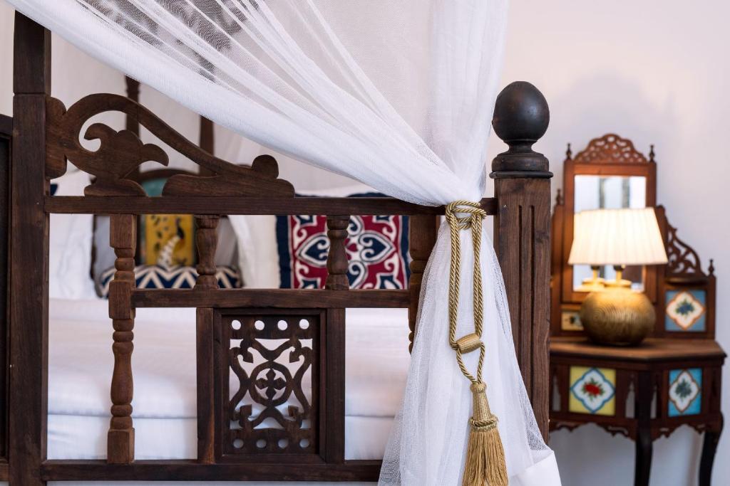 Postel nebo postele na pokoji v ubytování Tikitam Palms Boutique Hotel