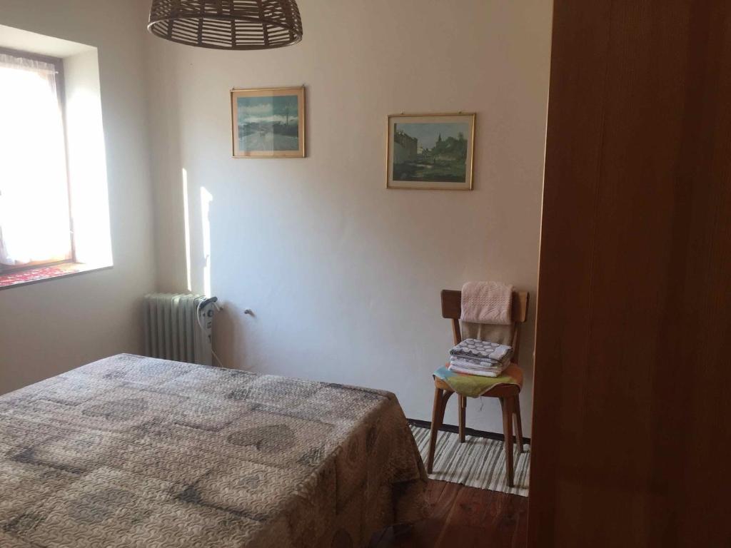 A bed or beds in a room at Da Duccio e Maria