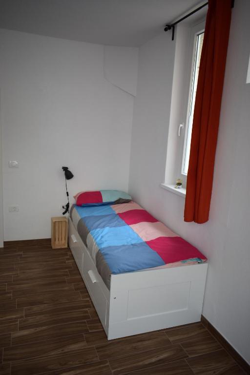 Postel nebo postele na pokoji v ubytování Sobe Argo Izola