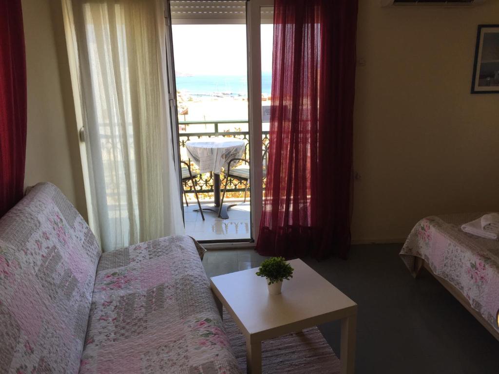Postel nebo postele na pokoji v ubytování Platanos Rooms
