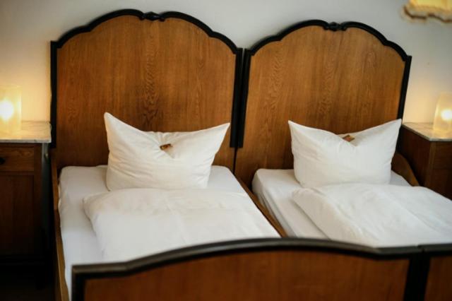 Postel nebo postele na pokoji v ubytování Hofreit am Bierkeller