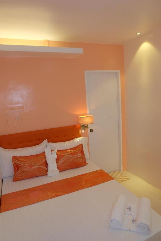Łóżko lub łóżka w pokoju w obiekcie Laule'a Hostel