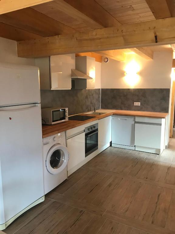 Kuchyň nebo kuchyňský kout v ubytování Augustine Appartement T3 Mezzanine