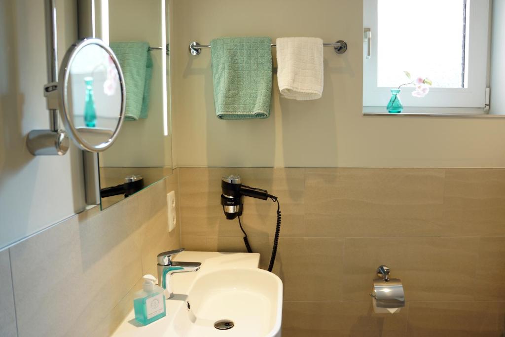 Koupelna v ubytování Hotel am Südwäldchen