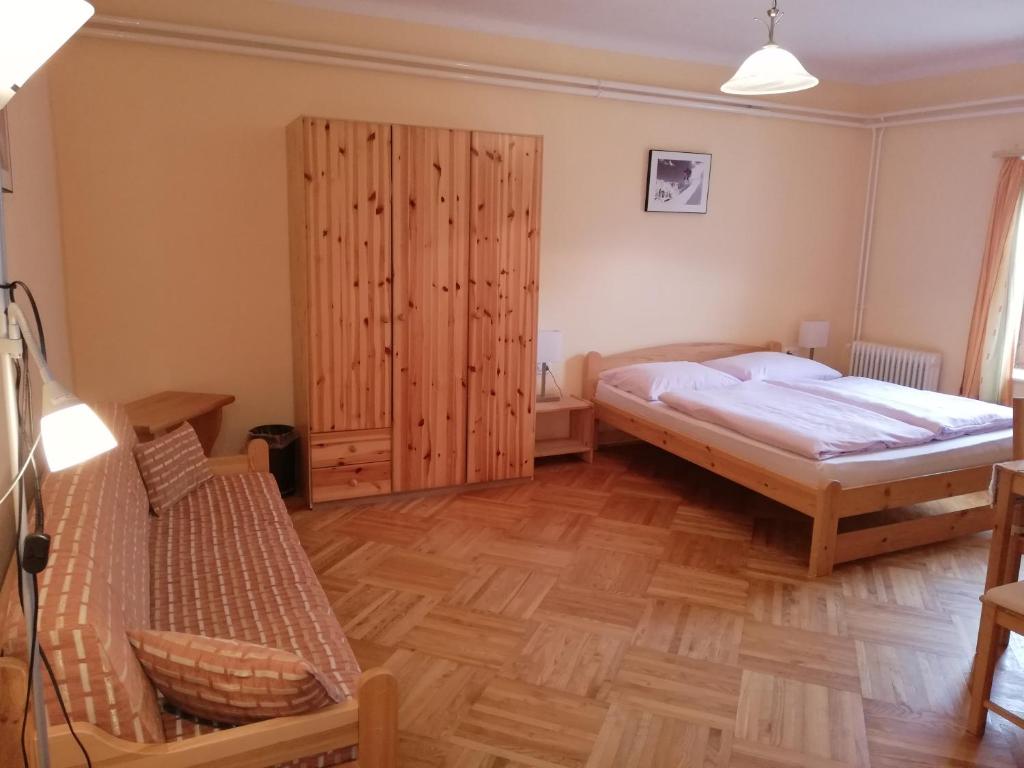 Postel nebo postele na pokoji v ubytování Gasthof Kirchenwirt
