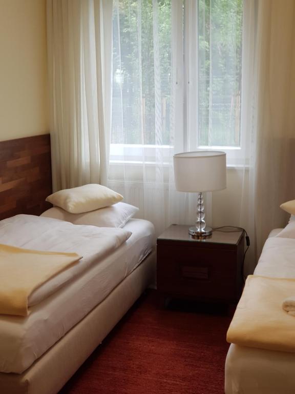 Postel nebo postele na pokoji v ubytování Apartamenty Dom Saski 10 minut od Centrum Warszawy