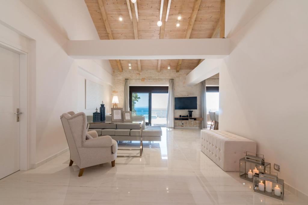 A seating area at Porto Vasilikos Villas