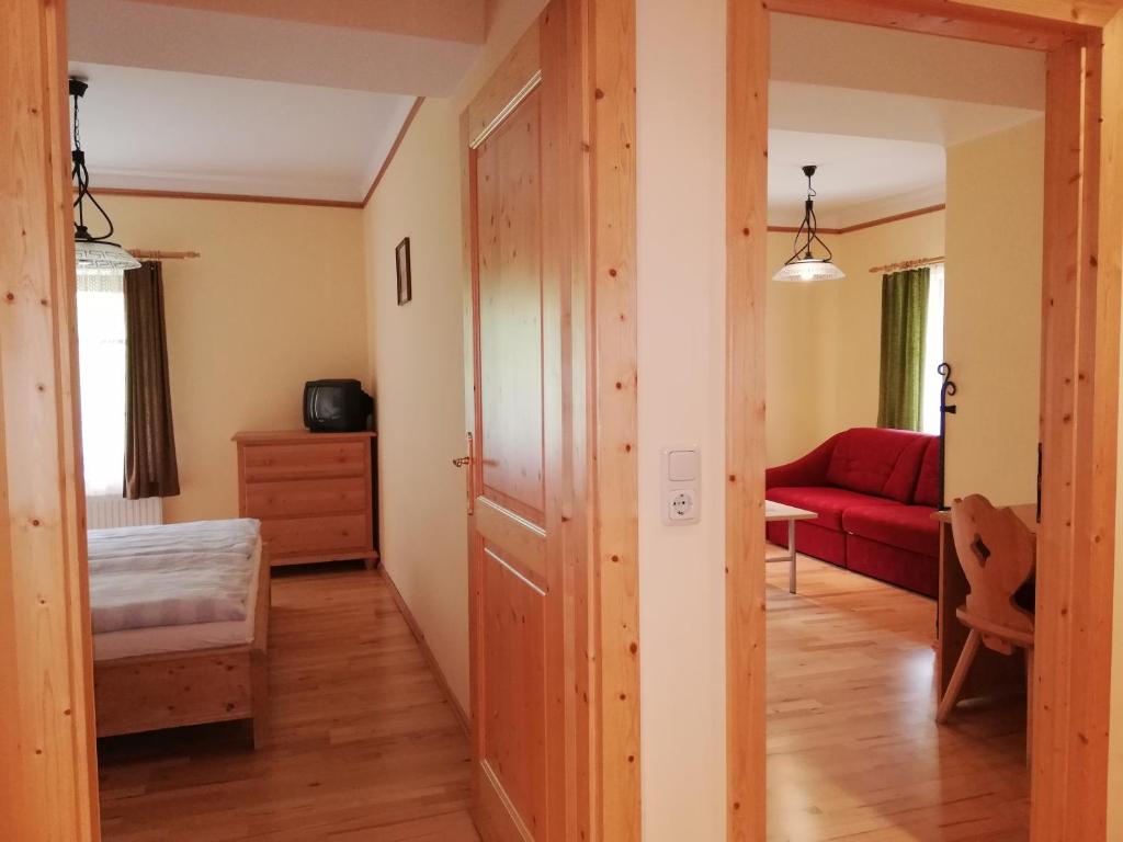 Postel nebo postele na pokoji v ubytování Gasthof Kirchenwirt