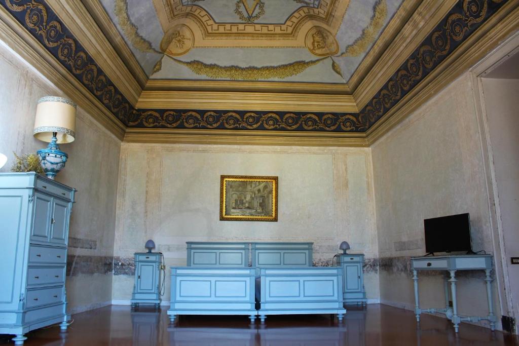 TV a/nebo společenská místnost v ubytování Palazzo Bernardini B & B
