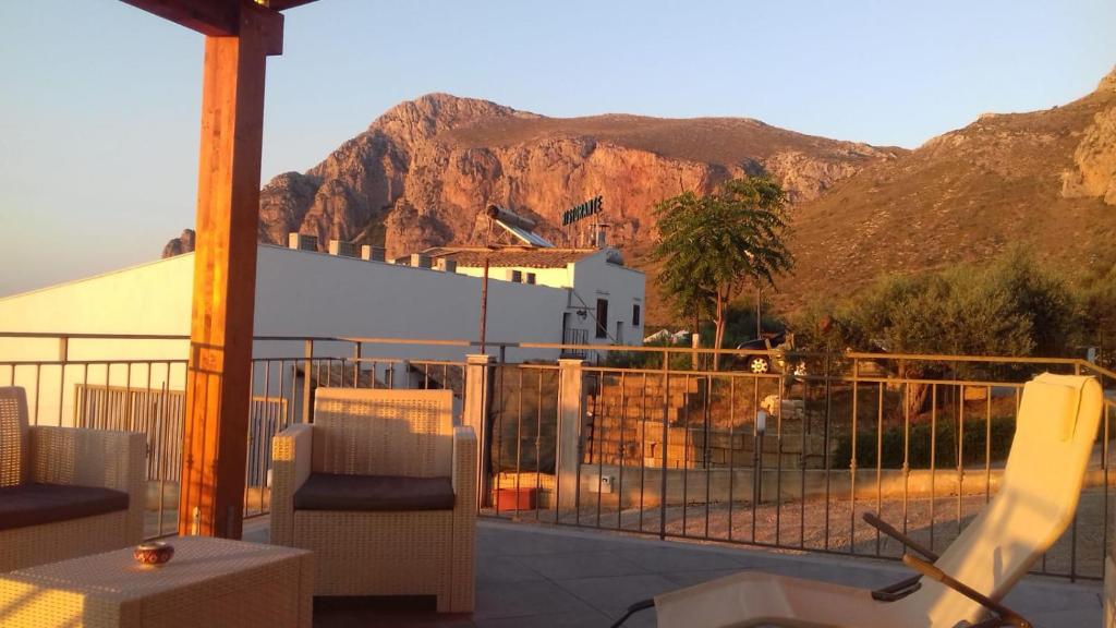 a balcony with a view of a mountain at Villa Cloe in San Vito lo Capo