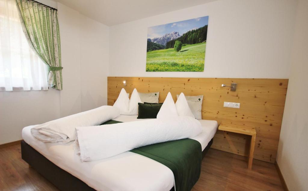 Postel nebo postele na pokoji v ubytování Residenz Erschbaum