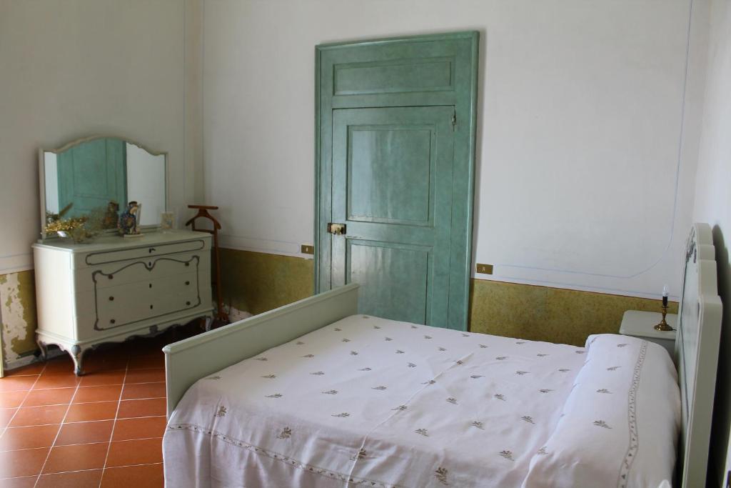 Postel nebo postele na pokoji v ubytování Palazzo Bernardini B & B
