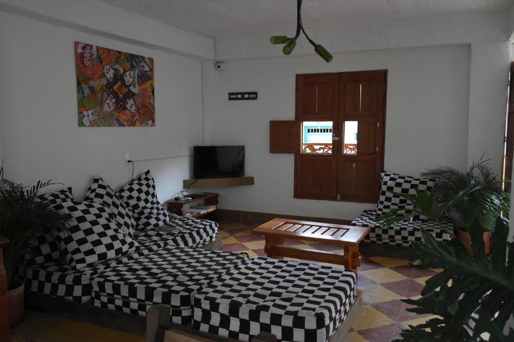 TV a/nebo společenská místnost v ubytování Sergeant Pepper's Hostel