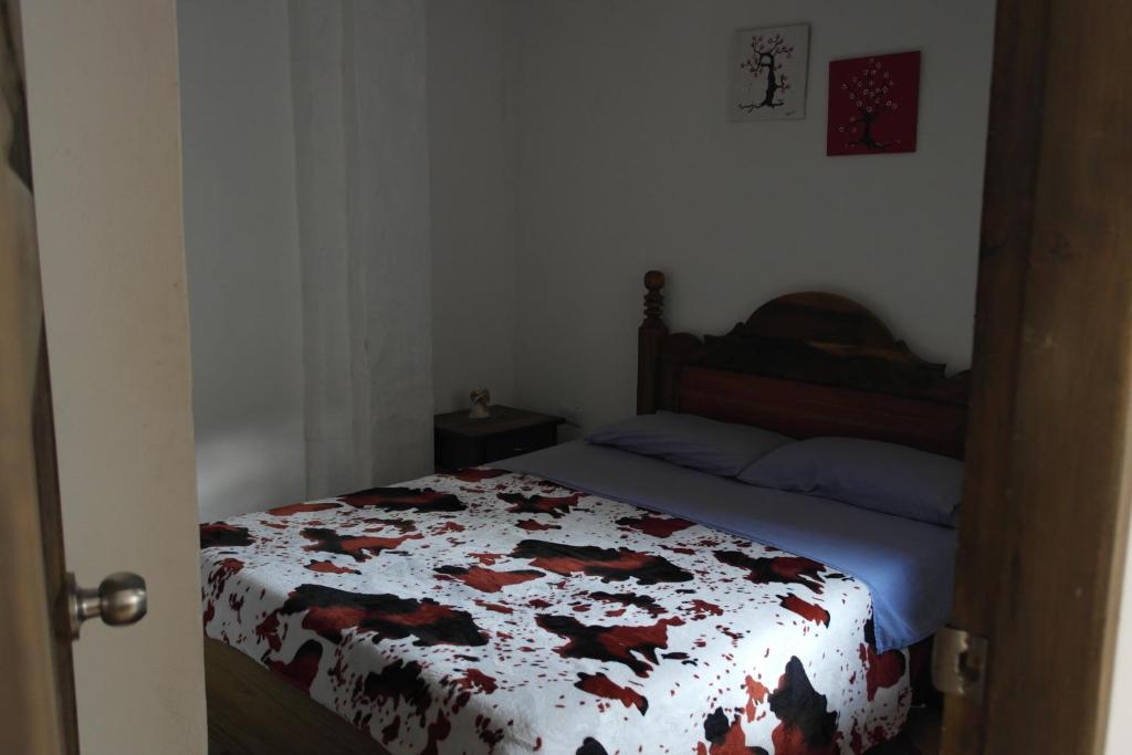 Postel nebo postele na pokoji v ubytování Sergeant Pepper's Hostel