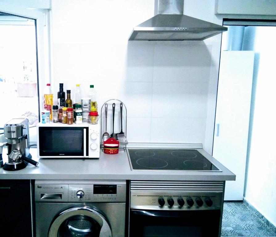 Kuchyň nebo kuchyňský kout v ubytování New Trendy apartment
