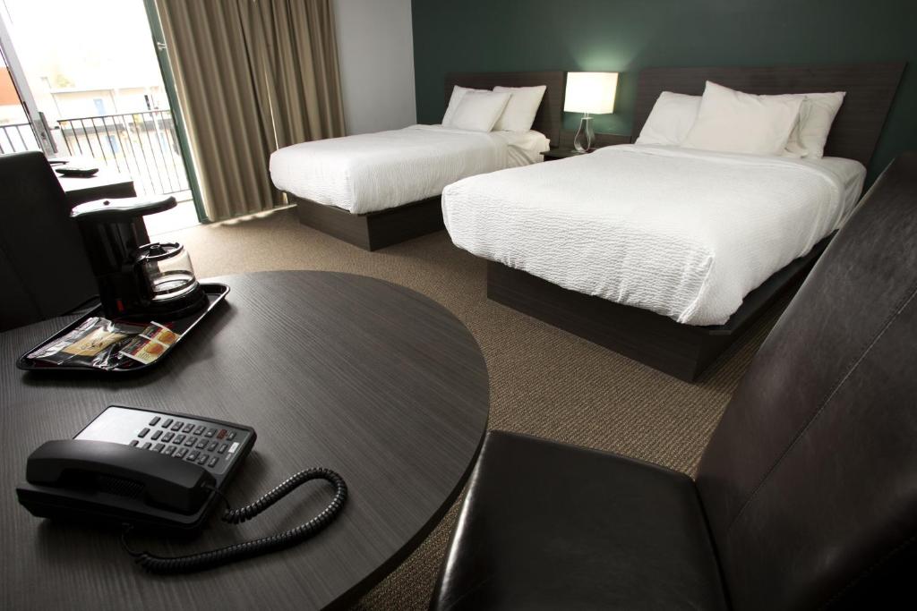 
Motel Room with Two Double Beds - Exterior Entrance
