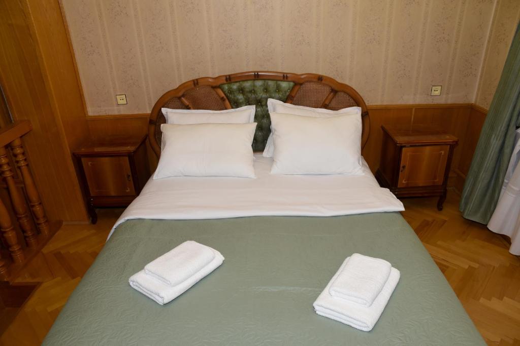 Postel nebo postele na pokoji v ubytování Guest House Kartuli Suli