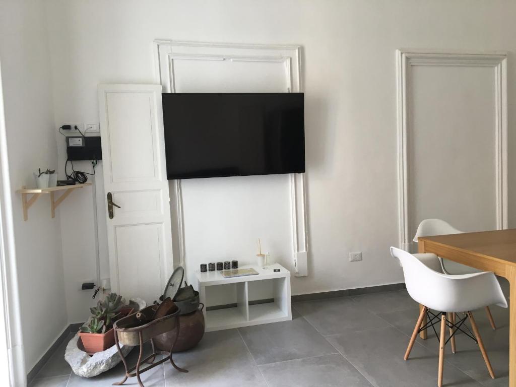 Televízia a/alebo spoločenská miestnosť v ubytovaní FraLePorte
