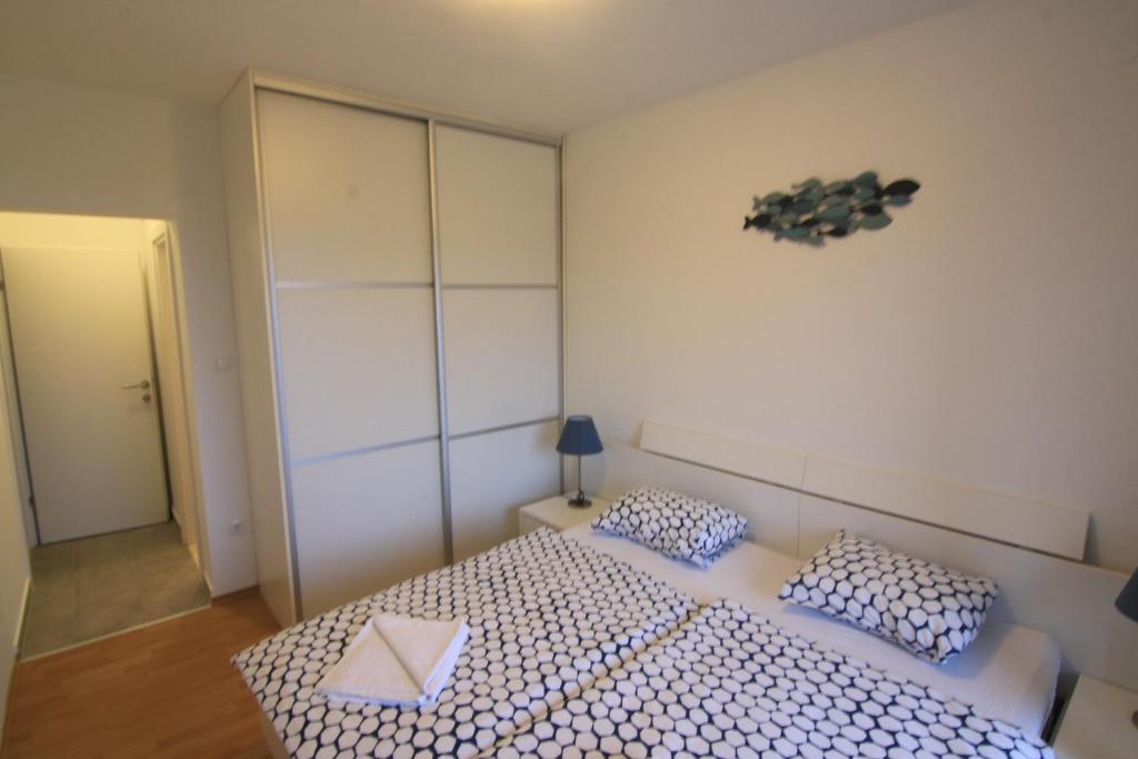 Postel nebo postele na pokoji v ubytování Guest House Marija