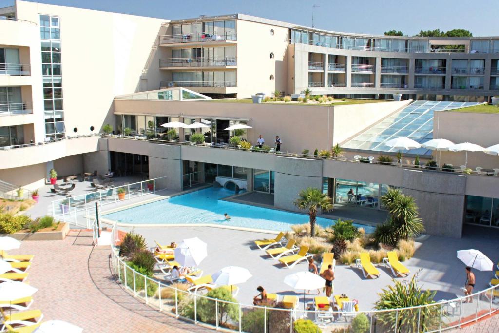 A piscina localizada em Club Vacances Bleues Les Jardins De l'Atlantique ou nos arredores