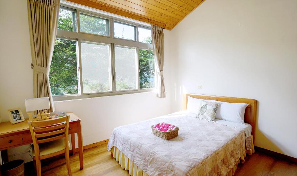 Postel nebo postele na pokoji v ubytování Red Brick Villas