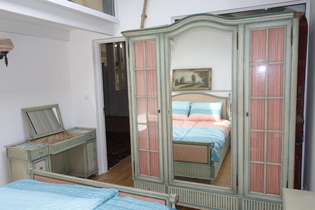 Postel nebo postele na pokoji v ubytování Le Paradis